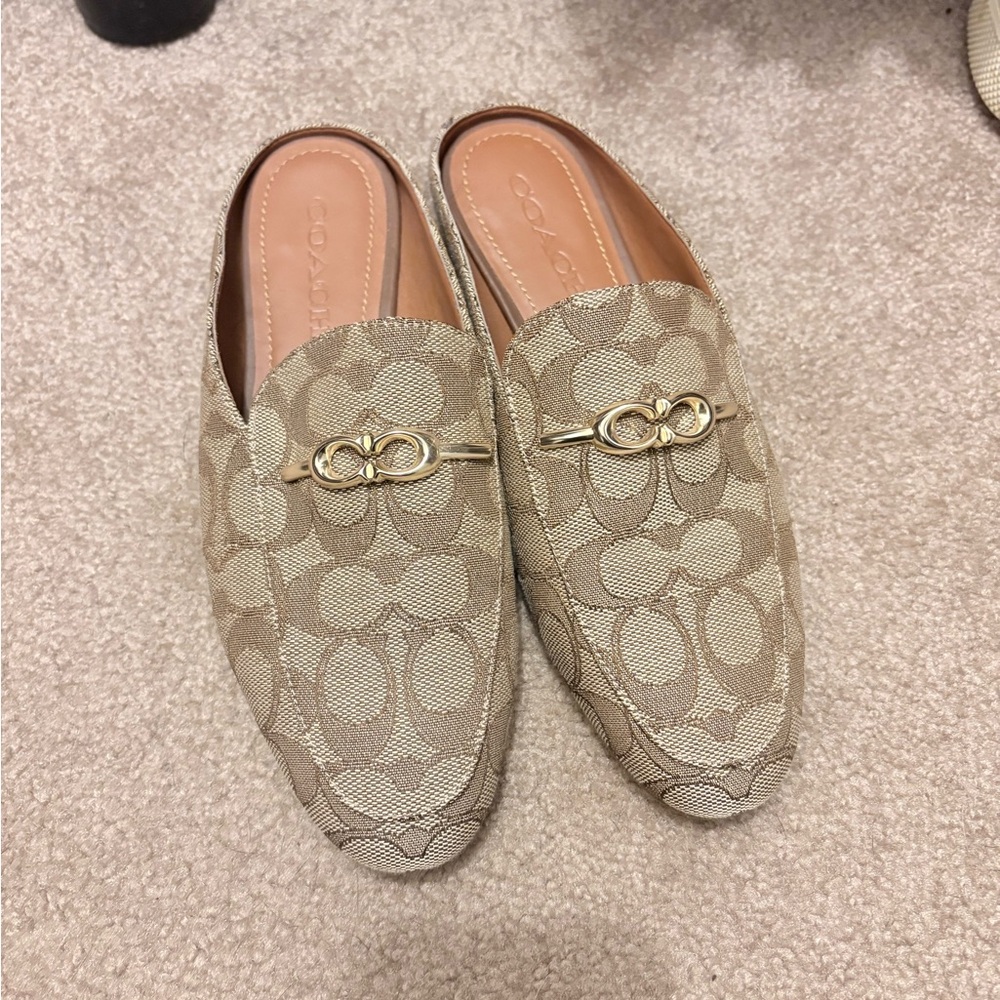 Coach women’s Khaki Signature Logo Slip-On Loafers with Gold Accent